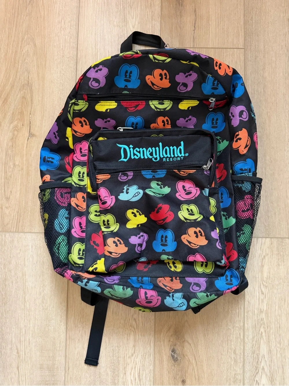 Disney Black Backpack with Multi-Color Mickey Heads